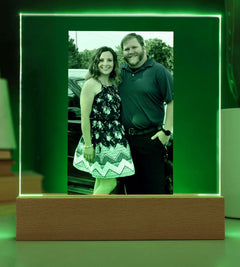 LED lighted picture frame displaying a couple's photo with a green glow.
